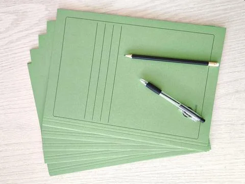 Document folder with pencil and pen 스톡 사진