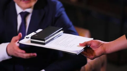 Document giving hand to hand slow motion Stock Footage 155112761