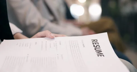 Document, hands and waiting room with resume for interview, job opportunity or Stock Footage 340774059