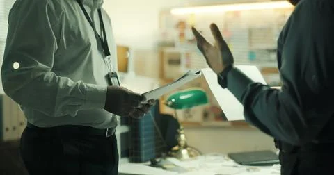 Document, hands or detective in office for collaboration, case briefing or Stock Photos