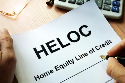 Document HELOC Home equity line of credit on a table. Stock Photos