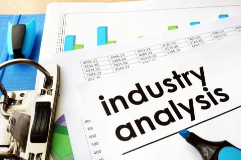 Document industry analysis in an office folder. Stock Photos