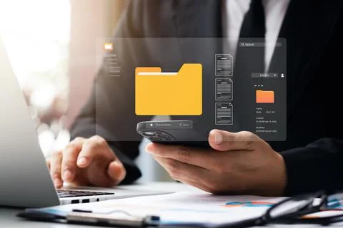 Document management system concept, business man holding folder and document  Stock Photos