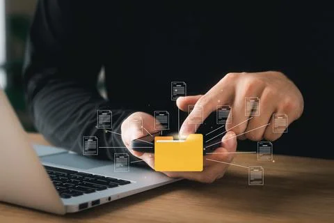 Document management system concept, business man holding folder and document  Stock Photos
