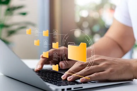 Document management system concept, business man holding folder and document  Stock Photos