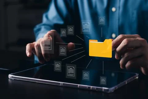 Document management system concept, business man holding folder and document  Stock Photos