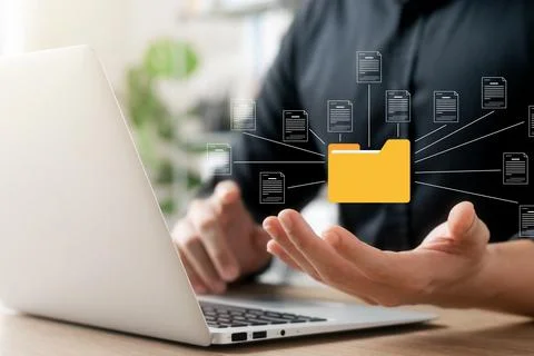 Document management system concept, business man holding folder and documen.. Stock Photos