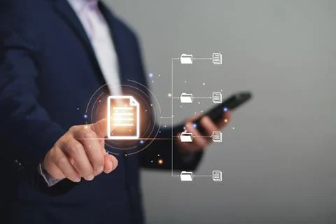 Document management system concept, business man using laptop search folder.. Stock Photos