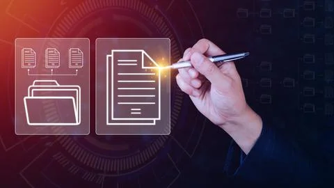 Document Management System (DMS) being setup IT consultant working on lapto.. Stock Photos