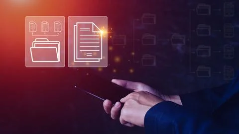 Document Management System (DMS) being setup IT consultant working on smart.. Stock Photos