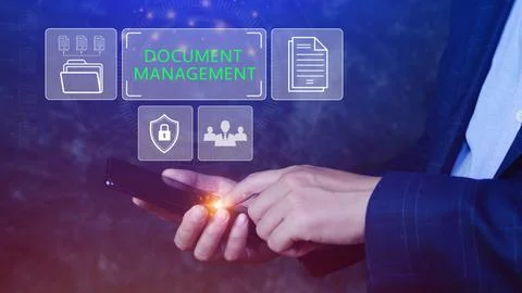 Document Management System (DMS) being setup IT consultant working on smart.. Stock Photos
