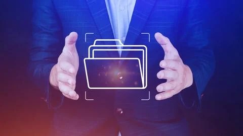 Document Management System (DMS) being setup IT consultant working on lapto.. Stock Photos