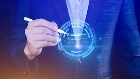 Document Management System (DMS) being setup IT consultant working on lapto.. Stock Photos