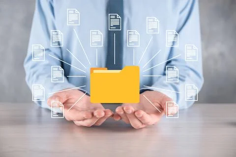 Document Management System DMS .Businessman hold folder and document icon.Sof 스톡 사진