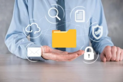 Document Management System DMS .Businessman hold folder and document icon.Sof 写真素材