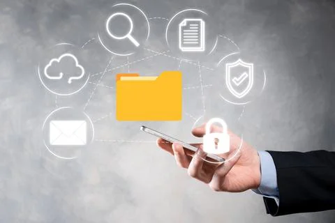 Document Management System DMS .Businessman hold folder and document icon.Sof 写真素材