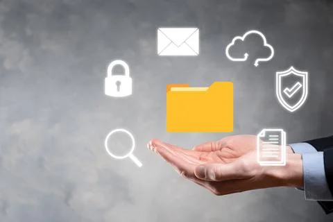 Document Management System DMS .Businessman hold folder and document icon.Sof 写真素材