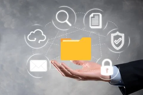 Document Management System DMS .Businessman hold folder and document icon.Sof Stockfoto's