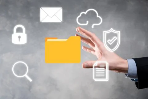 Document Management System DMS .Businessman hold folder and document icon.Sof Stockfoto's