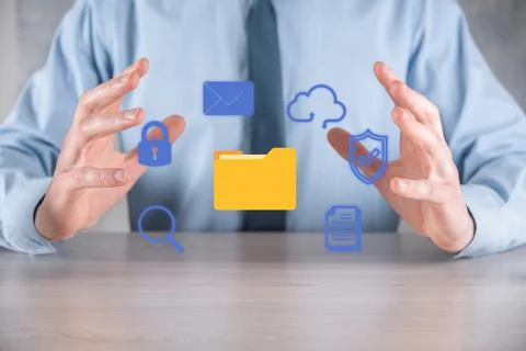 Document Management System DMS .Businessman hold folder and document icon.Sof 写真素材