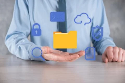 Document Management System DMS .Businessman hold folder and document icon.Sof Stockfoto's