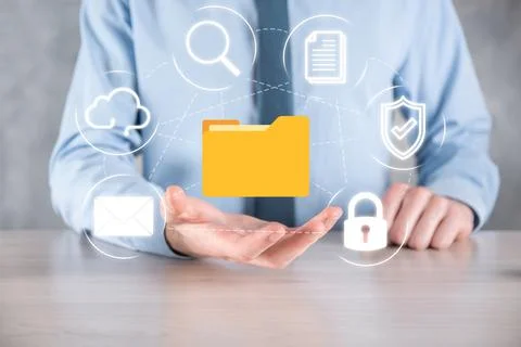 Document Management System DMS .Businessman hold folder and document icon.Sof 写真素材