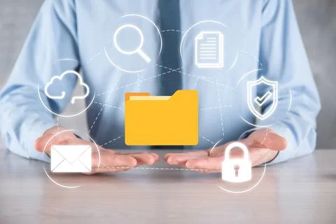 Document Management System DMS .Businessman hold folder and document icon.Sof Stockfoto's