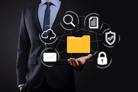 Document Management System DMS .Businessman hold folder and document icon.Sof 写真素材