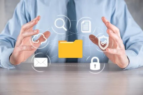 Document Management System DMS .Businessman hold folder and document icon.Sof Stockfoto's
