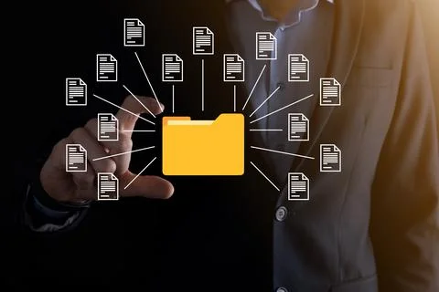 Document Management System DMS .Businessman hold folder and document icon.Sof Foto stock