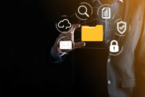 Document Management System DMS .Businessman hold folder and document icon.Sof 写真素材