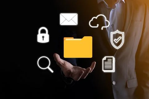 Document Management System DMS .Businessman hold folder and document icon.Sof 库存照片
