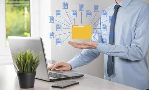 Document Management System DMS .Businessman hold folder and document icon.Sof 库存照片