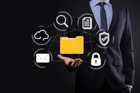 Document Management System DMS .Businessman hold folder and document icon.Sof Stockfoto's
