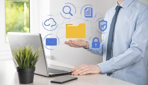 Document Management System DMS .Businessman hold folder and document icon.Sof Stockfoto's