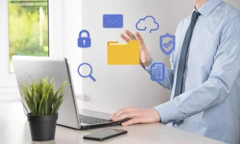 Document Management System DMS .Businessman hold folder and document icon.Sof 写真素材
