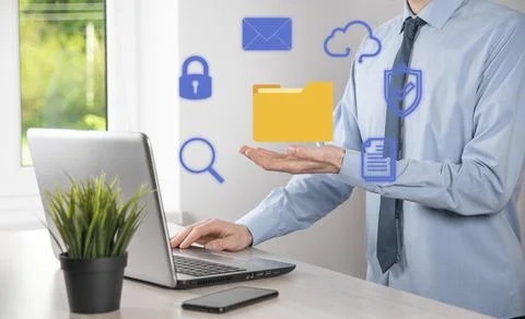 Document Management System DMS .Businessman hold folder and document icon.Sof 写真素材