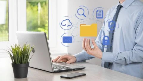 Document Management System DMS .Businessman hold folder and document icon.Sof Stockfoto's