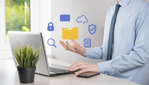 Document Management System DMS .Businessman hold folder and document icon.Sof 写真素材