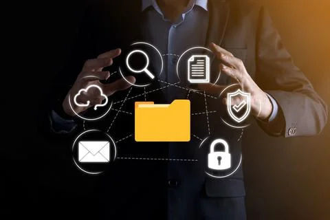 Document Management System DMS .Businessman hold folder and document icon.Sof Stockfoto's