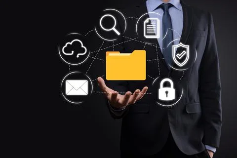 Document Management System DMS .Businessman hold folder and document icon.Sof Stockfoto's
