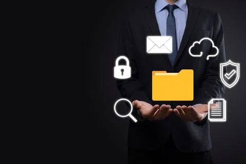 Document Management System DMS .Businessman hold folder and document icon.Sof 写真素材