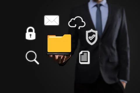 Document Management System DMS .Businessman hold folder and document icon.Sof 写真素材