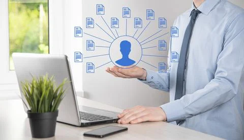 Document Management System DMS .Businessman hold doctor and document icon.Sof Фото