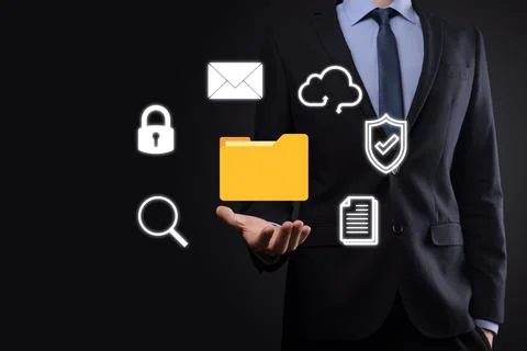 Document Management System DMS .Businessman hold folder and document icon.Sof Stockfoto's