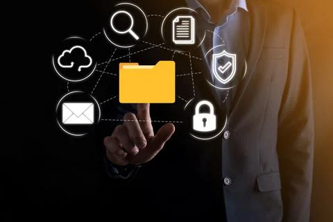 Document Management System DMS .Businessman hold folder and document icon.Sof Stockfoto's