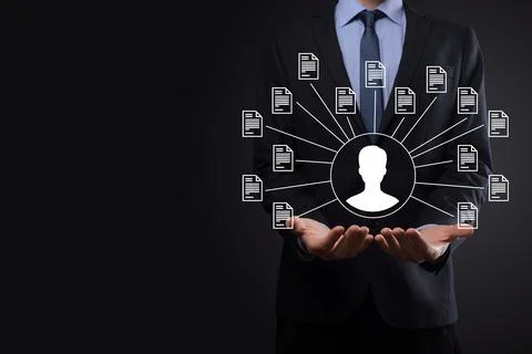 Document Management System DMS .Businessman hold user and document icon.Softw Stock Photos