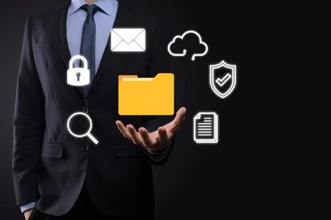 Document Management System DMS .Businessman hold folder and document icon.Sof 写真素材