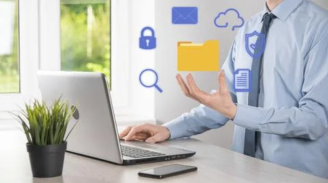 Document Management System DMS .Businessman hold folder and document icon.Sof 写真素材