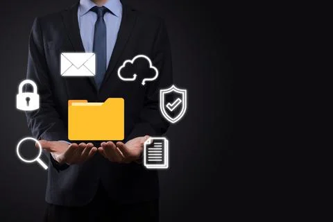Document Management System DMS .Businessman hold folder and document icon.Sof 写真素材